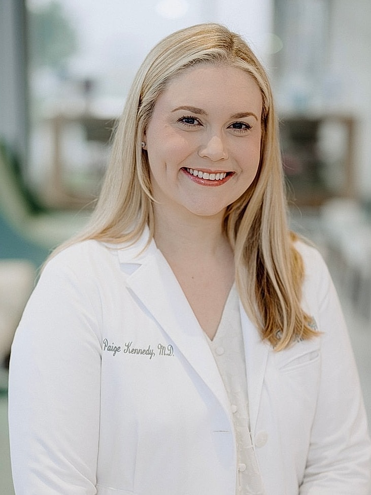 Dr. Paige Kennedy in white coat portrait.