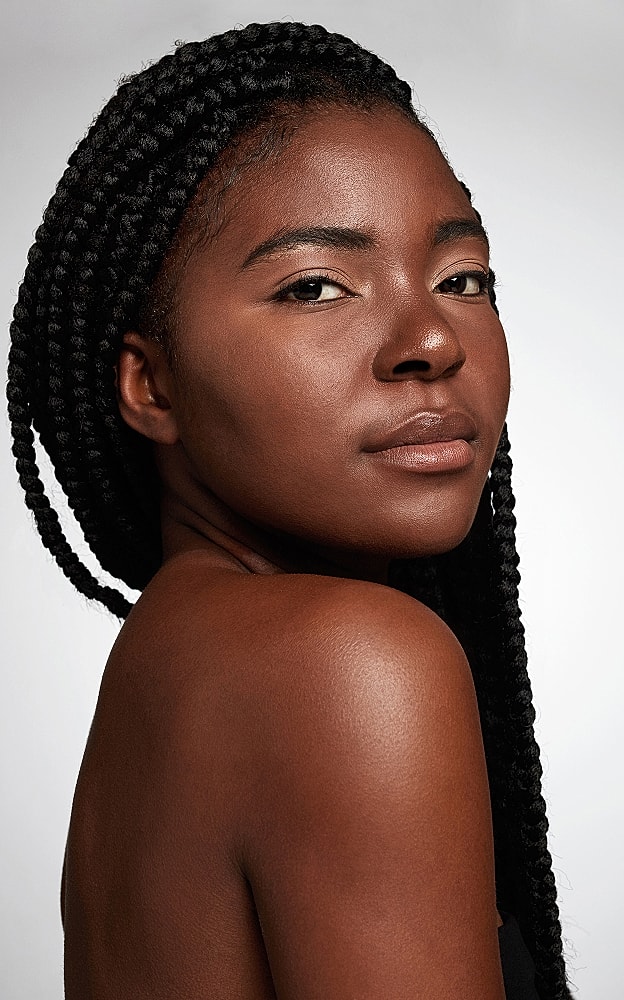 Portrait of a Lafayette facial plastic surgery model with braided hair.