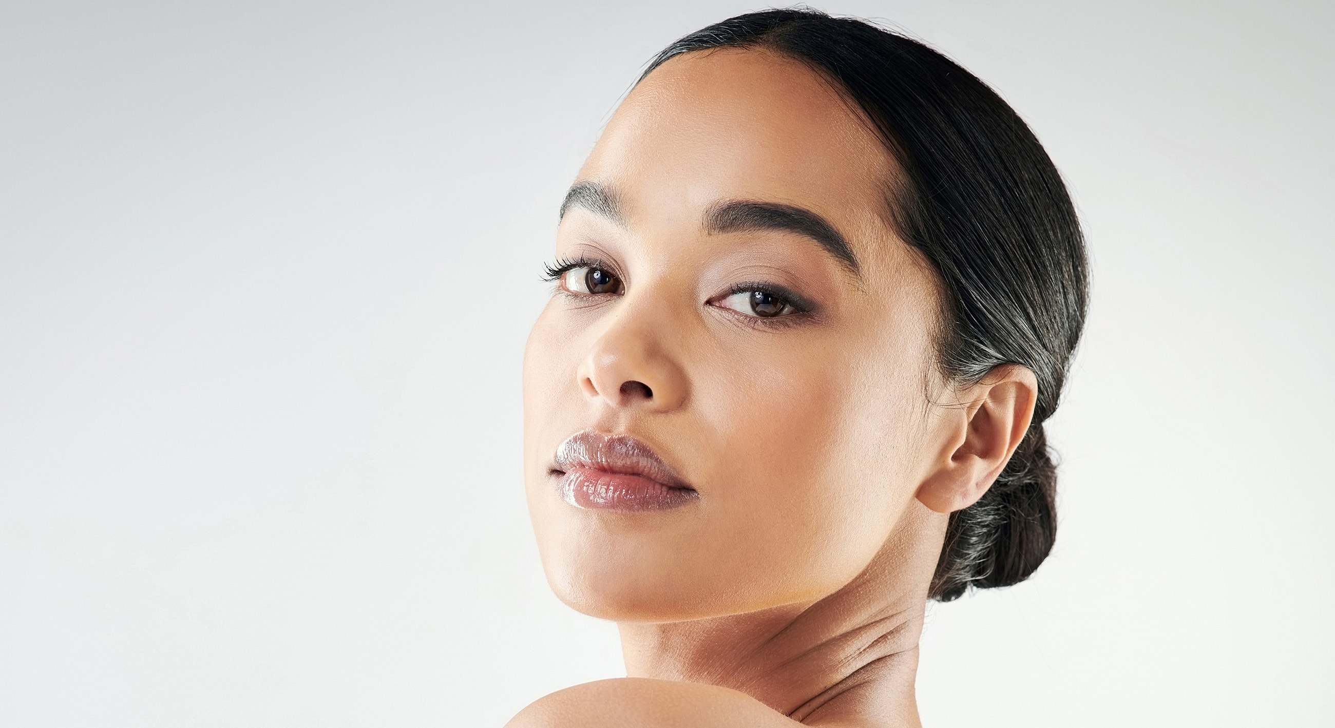 Lafayette Botox model with sleek hair and confident expression.