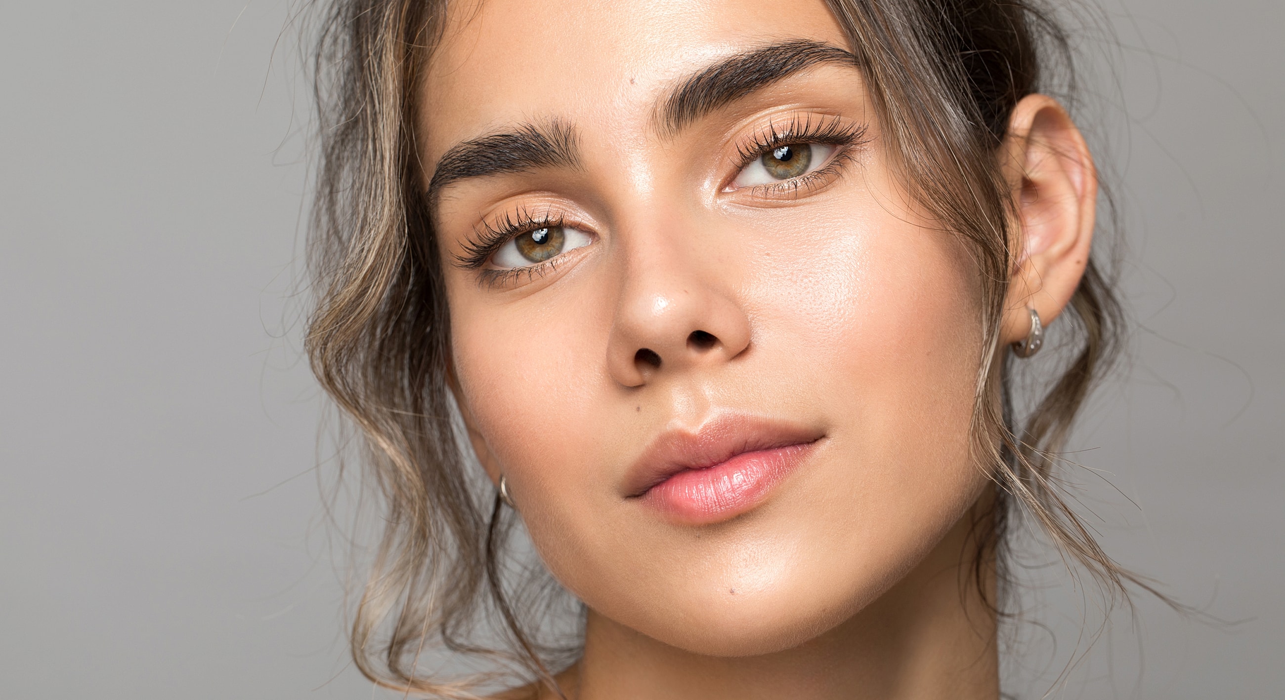 Close-up of a Lafayette chemical peel model's face with natural makeup.
